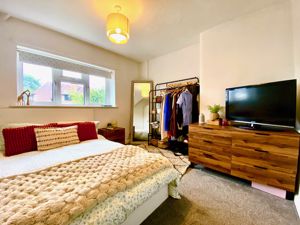Bedroom One- click for photo gallery